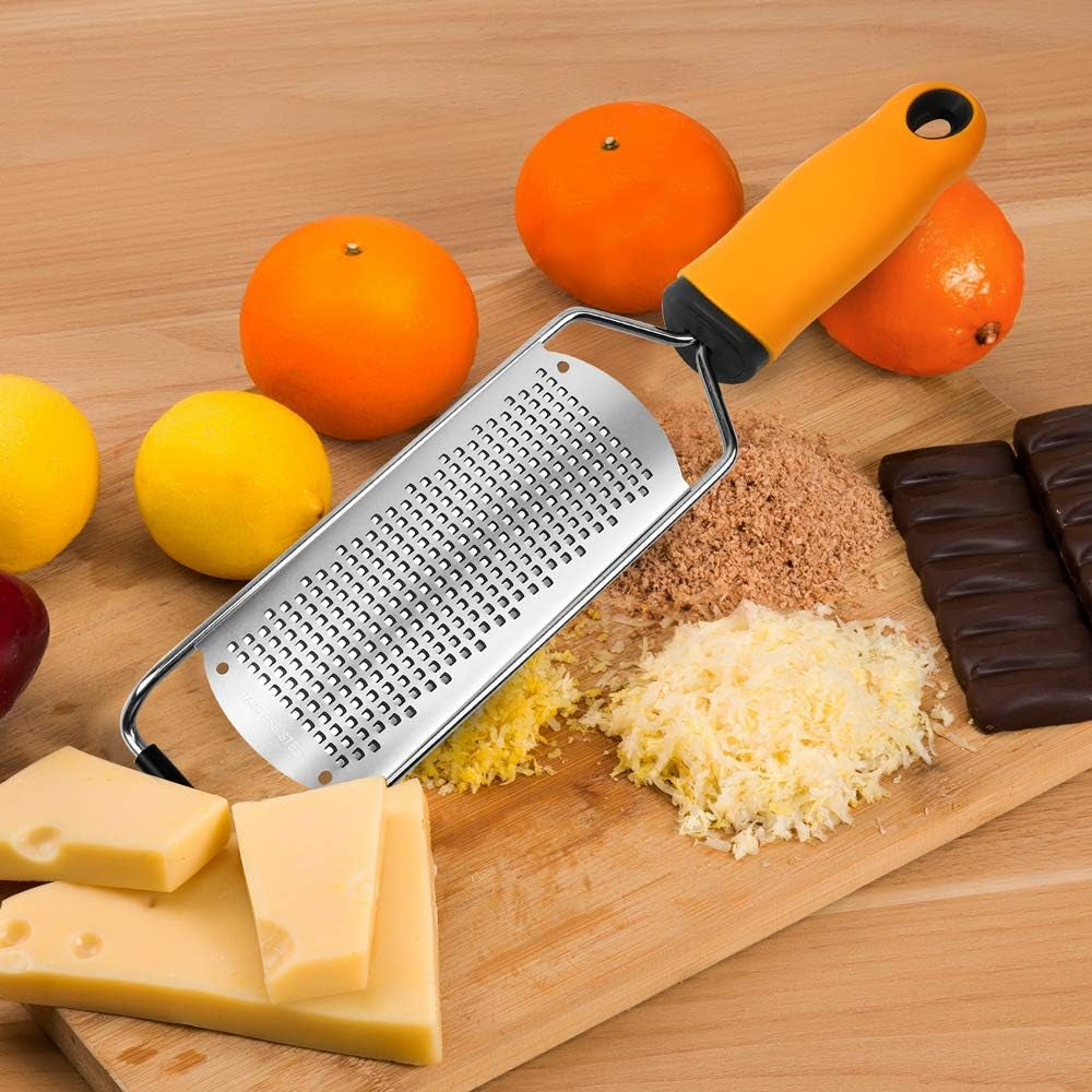 Elevate Your Cooking Game! 🍋✨ Meet the Pro Zester Grater - Perfect for Citrus, Parmesan, & Chocolate! Razor-Sharp Stainless Steel, Includes Protective Cover & Cleaning Brush, Plus Dishwasher Safe! 🧑🍳 #KitchenEssentials #BakingMadeEasy
