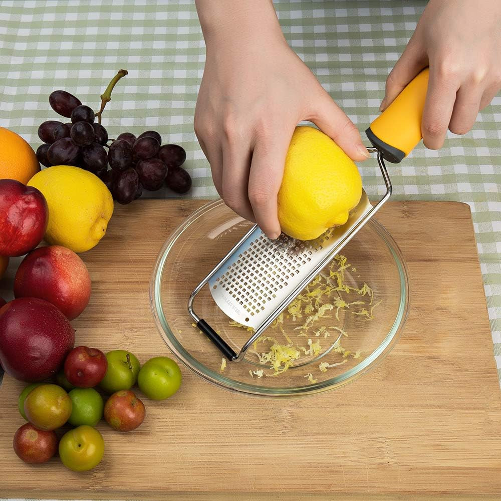 Elevate Your Cooking Game! 🍋✨ Meet the Pro Zester Grater - Perfect for Citrus, Parmesan, & Chocolate! Razor-Sharp Stainless Steel, Includes Protective Cover & Cleaning Brush, Plus Dishwasher Safe! 🧑🍳 #KitchenEssentials #BakingMadeEasy